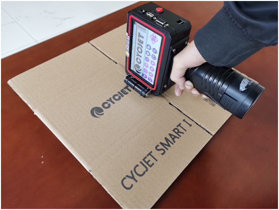 Portable handheld inkjet printer